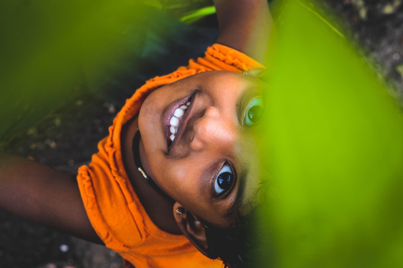 Close-up of a young girl. Smiling, undergoing gingival graft treatment.