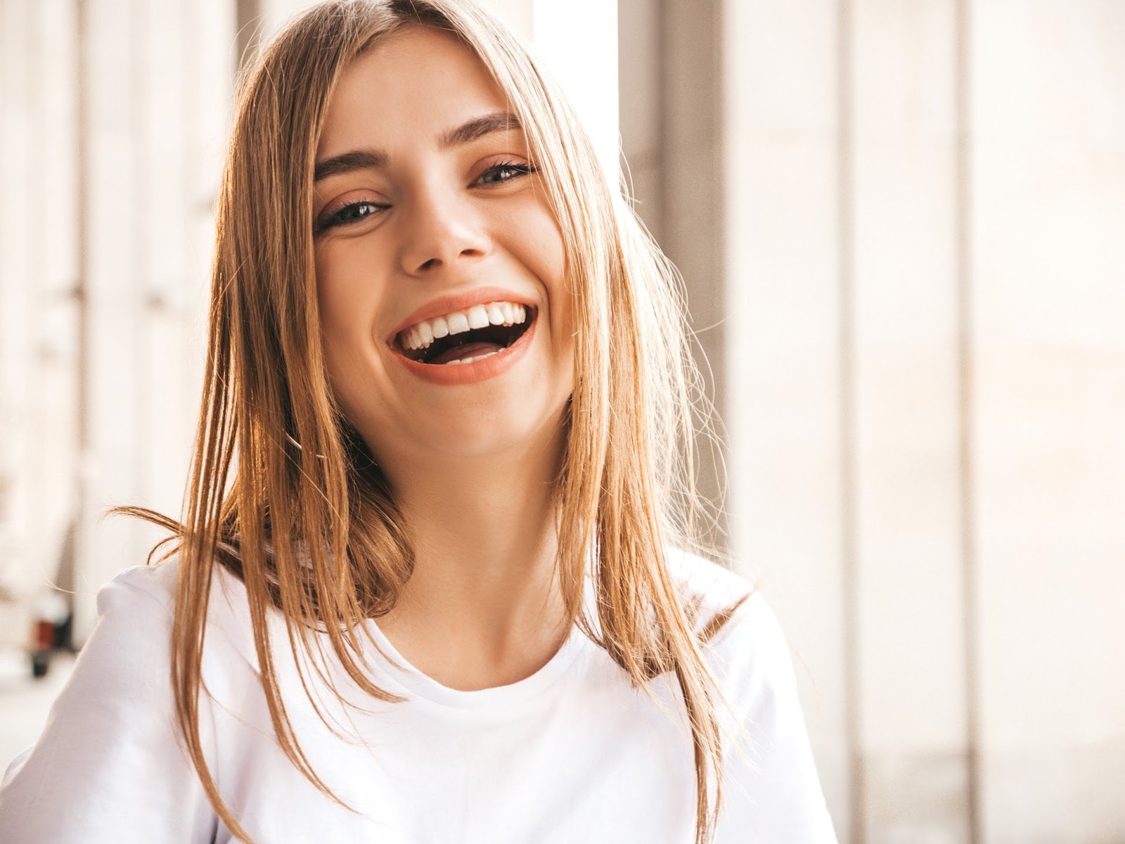 Close-up of a girl smiling.